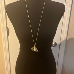 Abalone shell  and gold tone bee pendant style necklace.